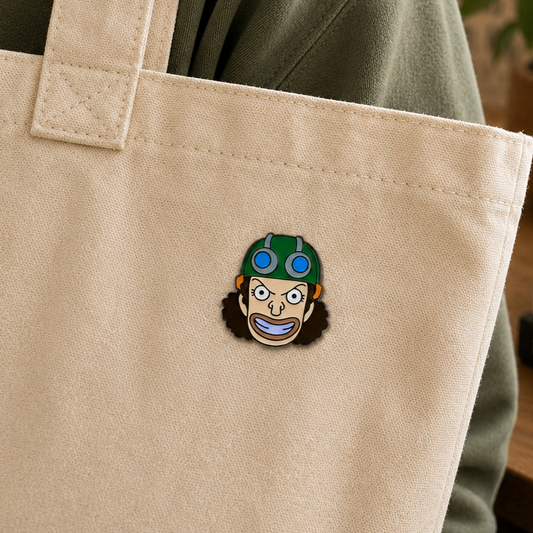 Usopp enamel pin from Pinlord.com featuring a detailed design of the One Piece character with a target symbol.