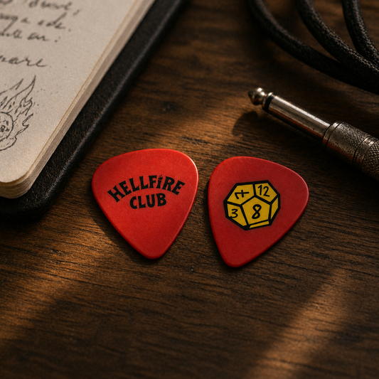 Red Hellfire Club D12 guitar pick by Pinlord.com, featuring a fiery devil design on a smooth plastic pick for electric guitar.