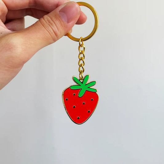 Custom Pinlord.com keychains featuring personalized designs, colorful keychain accessories on a keyring.