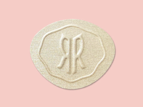 Close-up of embossed stickers from Fast Printing USA by Pinlord.com, showcasing detailed design and high-quality craftsmanship.