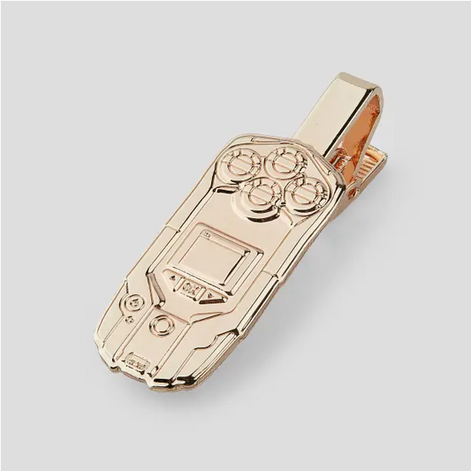 Close-up of THE/STUDIO Review manufacturer pin from Pinlord.com showing detailed design and branding on a metal pin.