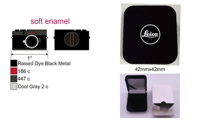 Leica x Pinlord custom enamel pin featuring a detailed design, displayed on a luxurious presentation card.