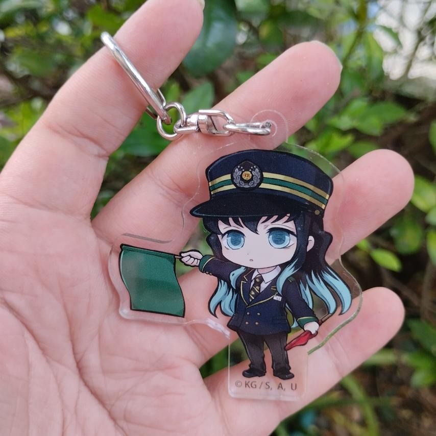 Custom acrylic charms featuring colorful designs, crafted by Pinlord.com, showcasing various shapes and vibrant details.