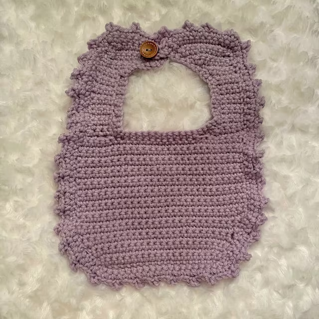 Free baby bib design template from Pinlord.com, showcasing a printable PDF for creating custom baby bibs.