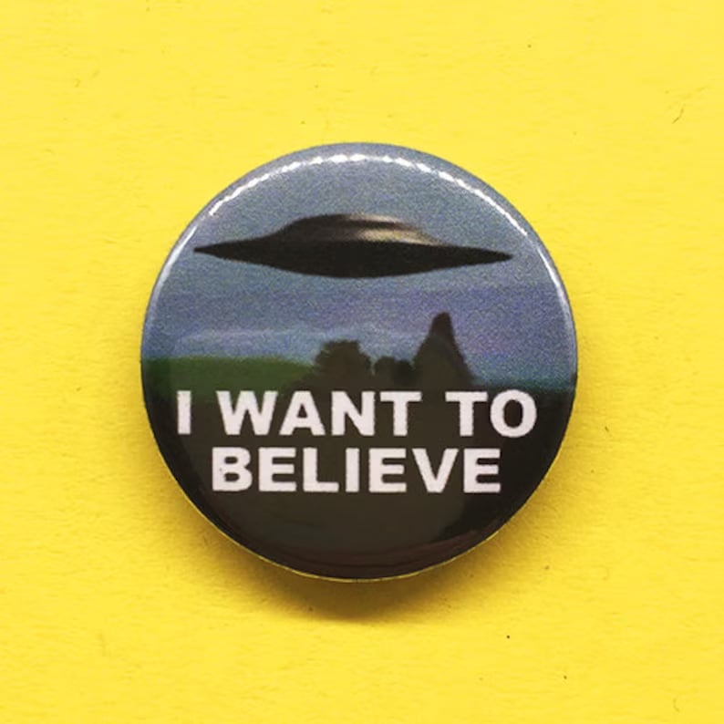 Close-up of custom button pins with various designs, showcasing unique badge styles from Pinlord.com.