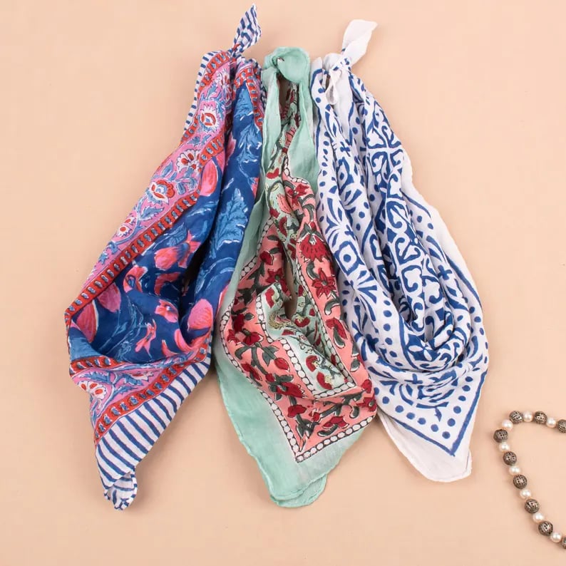 Custom human-themed bandanas by Pinlord.com featuring vibrant designs and unique patterns on high-quality fabric.