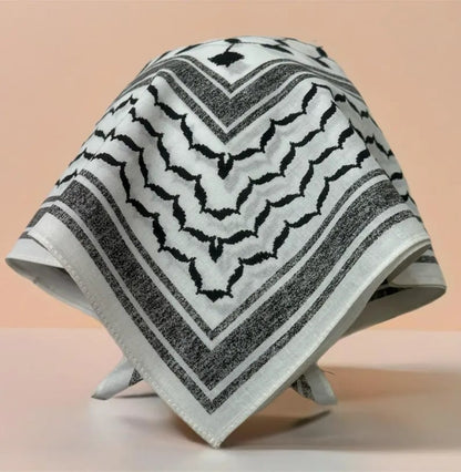 Custom human-themed bandanas by Pinlord.com featuring unique designs, made from soft fabric with vibrant colors.