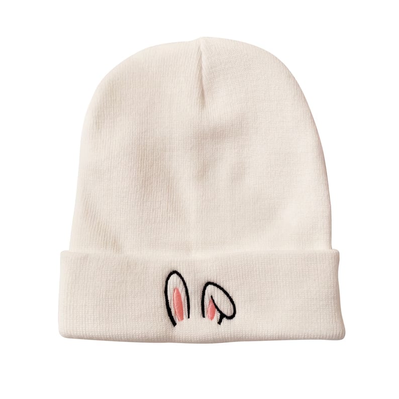 Custom beanies from Pinlord.com featuring unique designs, made of soft knit material, perfect for cold weather.
