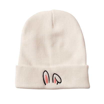 Custom beanies from Pinlord.com featuring unique designs, made of soft knit material, perfect for cold weather.
