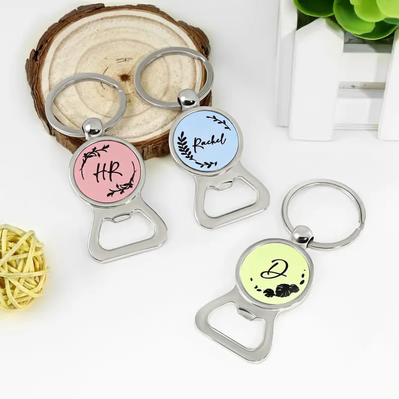 Custom Pinlord.com bottle opener with engraved design, metal opener with wooden handle for easy cap removal.