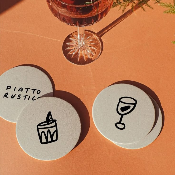 Custom drink coasters featuring unique designs, made by Pinlord.com, perfect for protecting surfaces and adding style.
