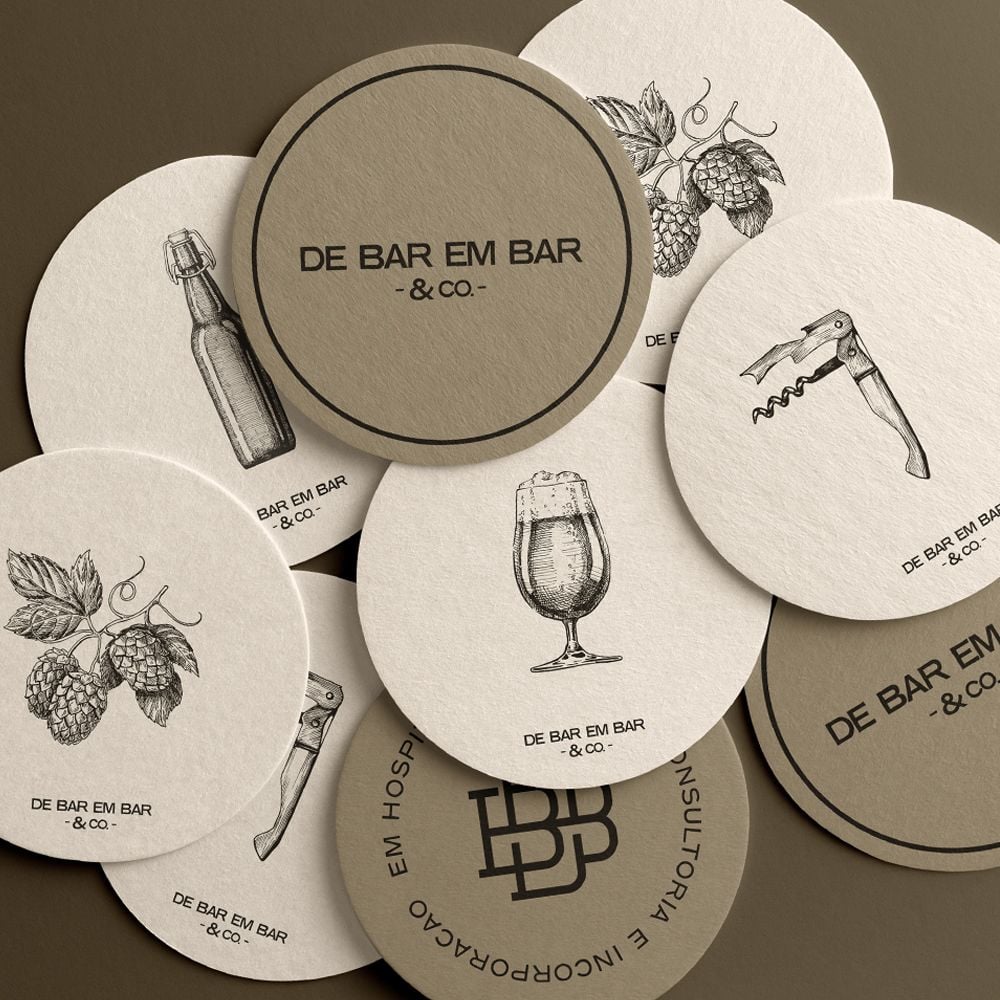 Custom drink coasters featuring unique designs, made by Pinlord.com, displayed on a table.