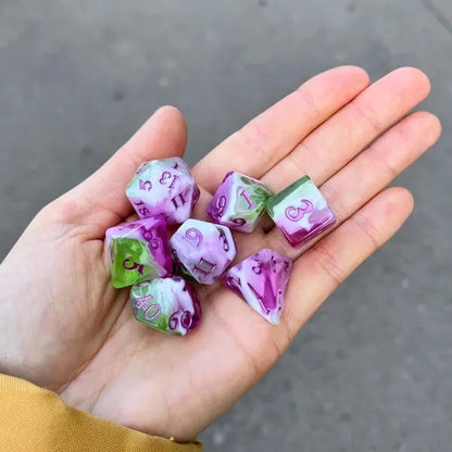 Custom gaming dice set from Pinlord.com, featuring colorful numbered polyhedral dice for tabletop role-playing games.