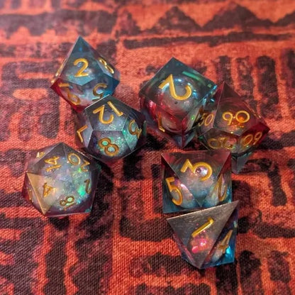 Custom gaming dice set from Pinlord.com featuring colorful, uniquely designed dice for tabletop role-playing games.