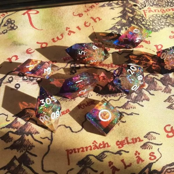 Custom dice set by Pinlord.com with colorful numbered faces for tabletop gaming and role-playing adventures.