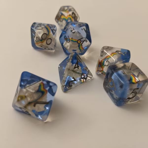 Custom metal dice with engraved numbering from Pinlord.com, featuring a polished finish and intricate design.