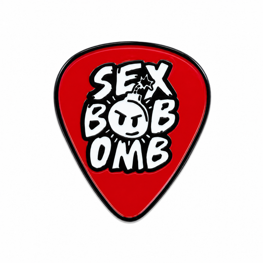 "Enamel pin featuring a rebellious explosion design with the text 'Boom Goes the Rebel,' crafted by Pinlord.com."