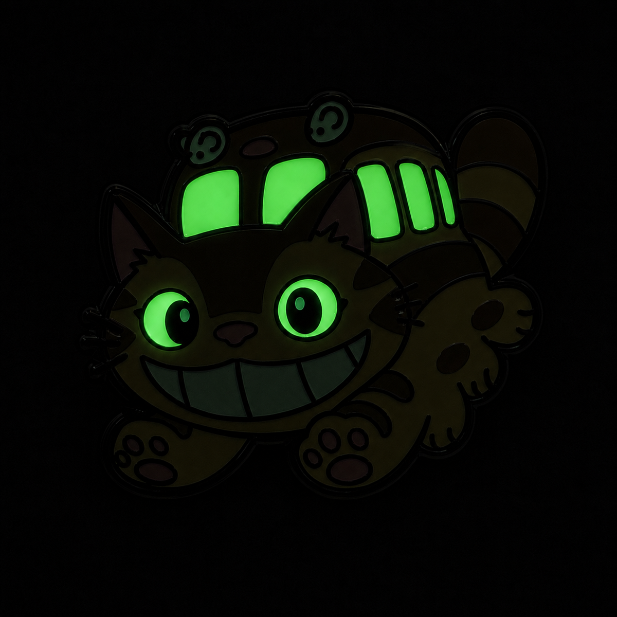 Enamel pin featuring a grinning Catbus companion, with detailed design and vibrant colors, perfect for anime and collectible pin fans.