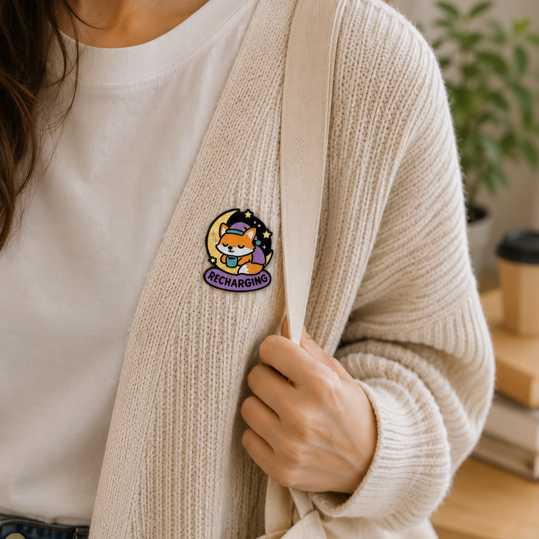 Recharging Fox enamel pin featuring a cute fox with a lightning bolt, detailed design in vibrant colors, ideal for pin collectors.