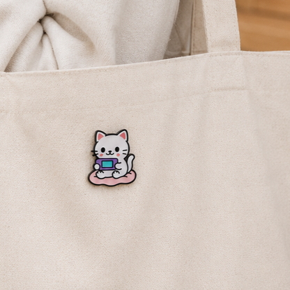 Tech Cat enamel pin featuring a sleek cat design, crafted by Pinlord.com, perfect for accessorizing clothing or backpacks.