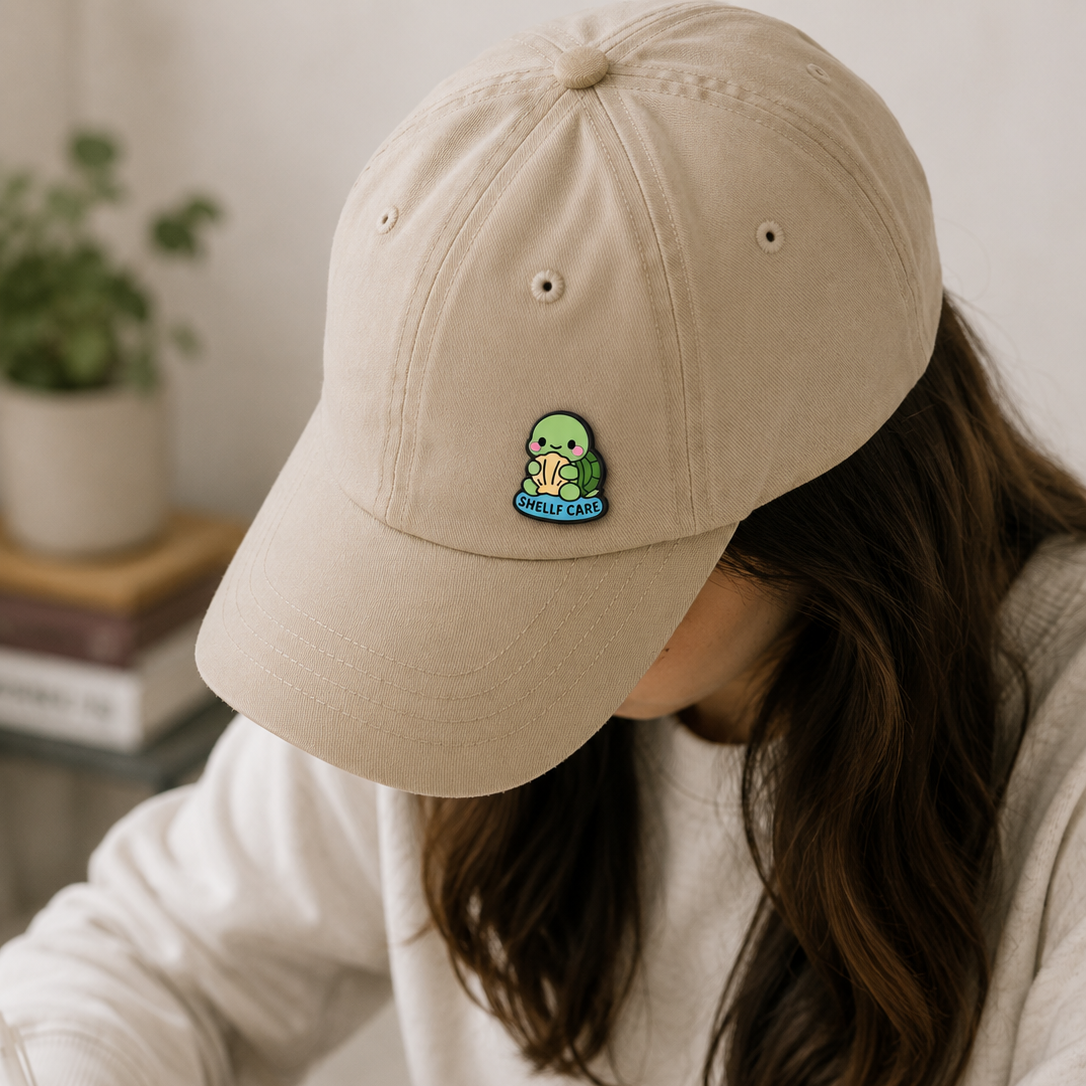 Enamel pin featuring a turtle design from the Shelf Care Turtle series by Pinlord.com, with vibrant enamel colors and detailed craftsmanship.