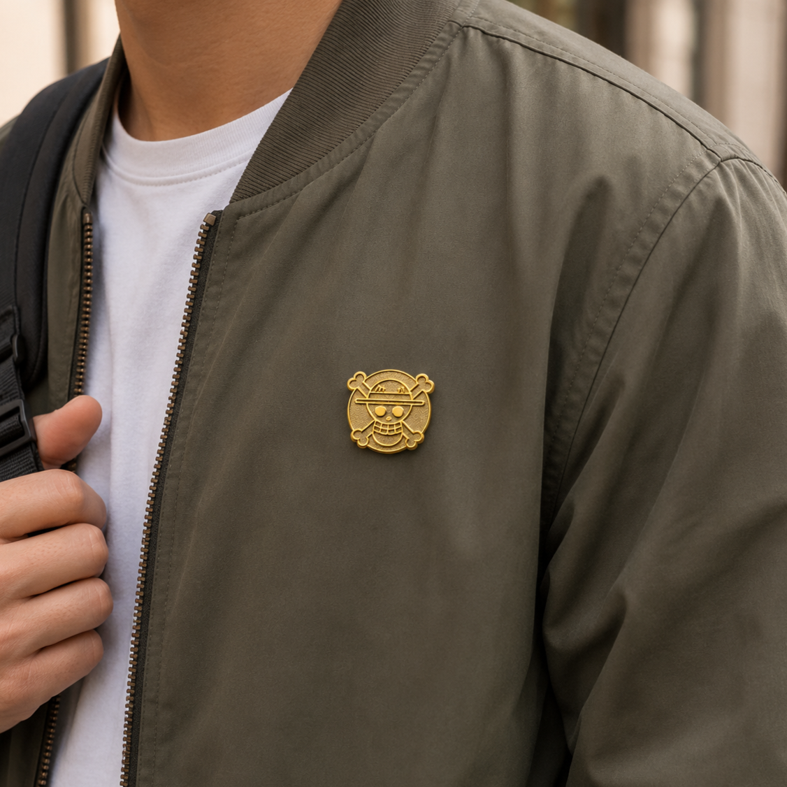 24k gold pirate flag enamel pin from Pinlord.com, featuring detailed pirate design on a shiny gold background.