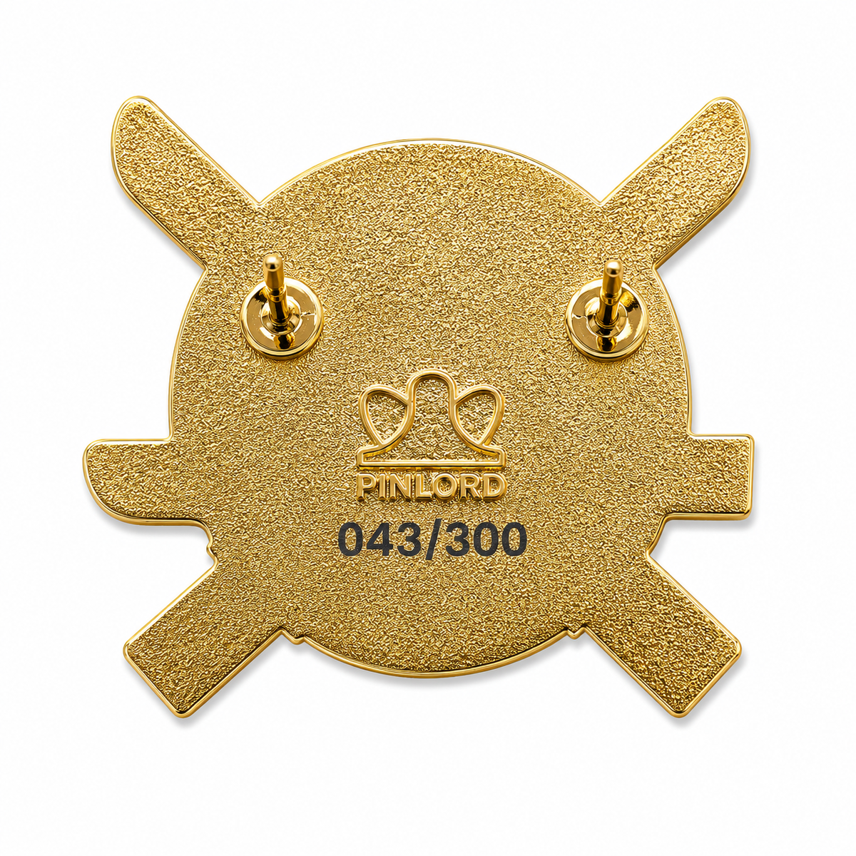 Gold 24k "Three-Blade Legend" logo enamel pin featuring a detailed three-blade design on a black background.