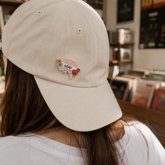 Enamel pin featuring "ADHD Appreciation" text with brain illustration, part of Snarky Co. collaboration by Pinlord.com
