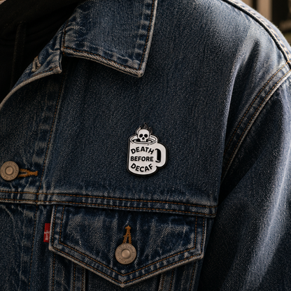 Death Before Decaf skull enamel pin featuring a detailed skull design, perfect for pin collectors and skull enthusiasts.