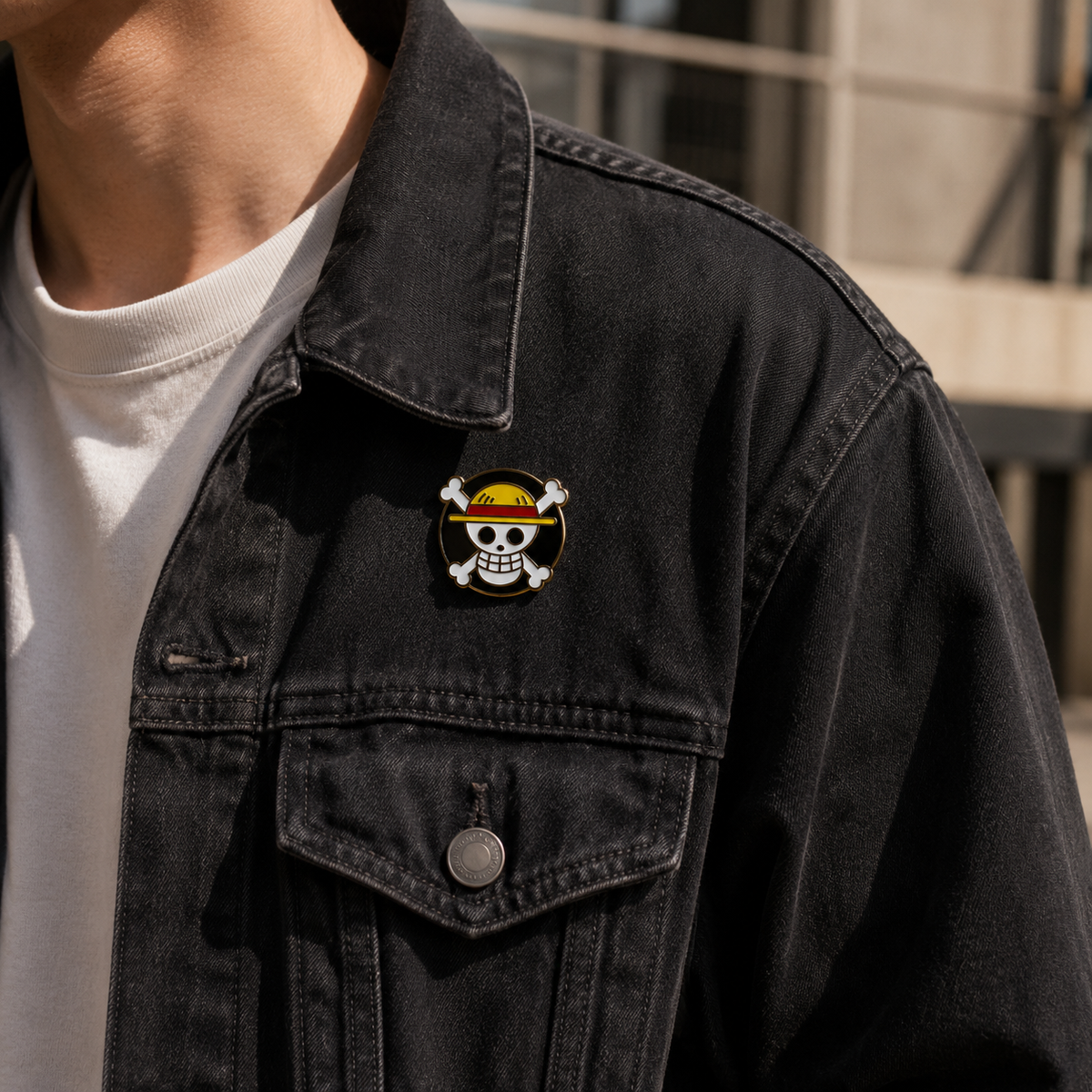 Black enamel pirate flag pin with gold accents, metal backing, and detailed design, perfect for pirate-themed accessories or jackets.