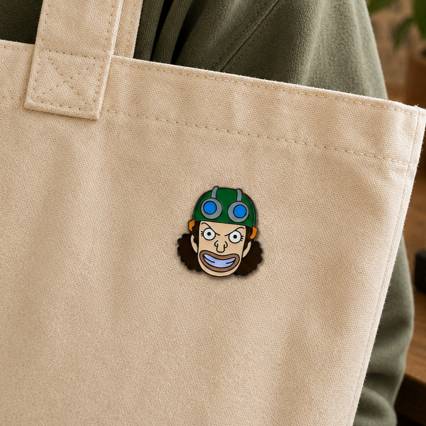 Usopp enamel pin from Pinlord.com featuring a detailed design of the One Piece character with a target symbol.