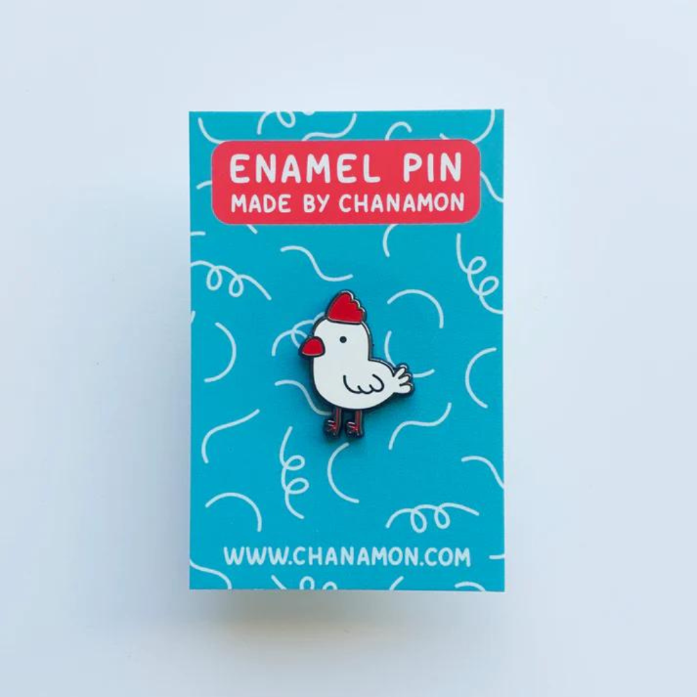 Custom enamel pins by Pinlord.com featuring colorful, detailed designs on high-quality metal with a polished finish.