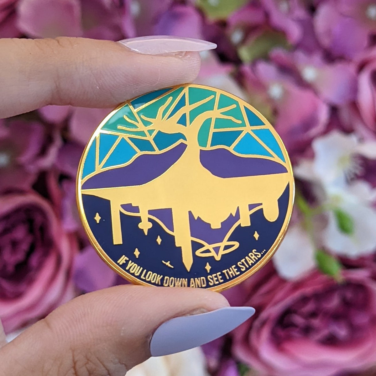 Custom enamel pins by Pinlord.com featuring colorful, detailed designs on a metal pin base, perfect for accessories and collectibles.