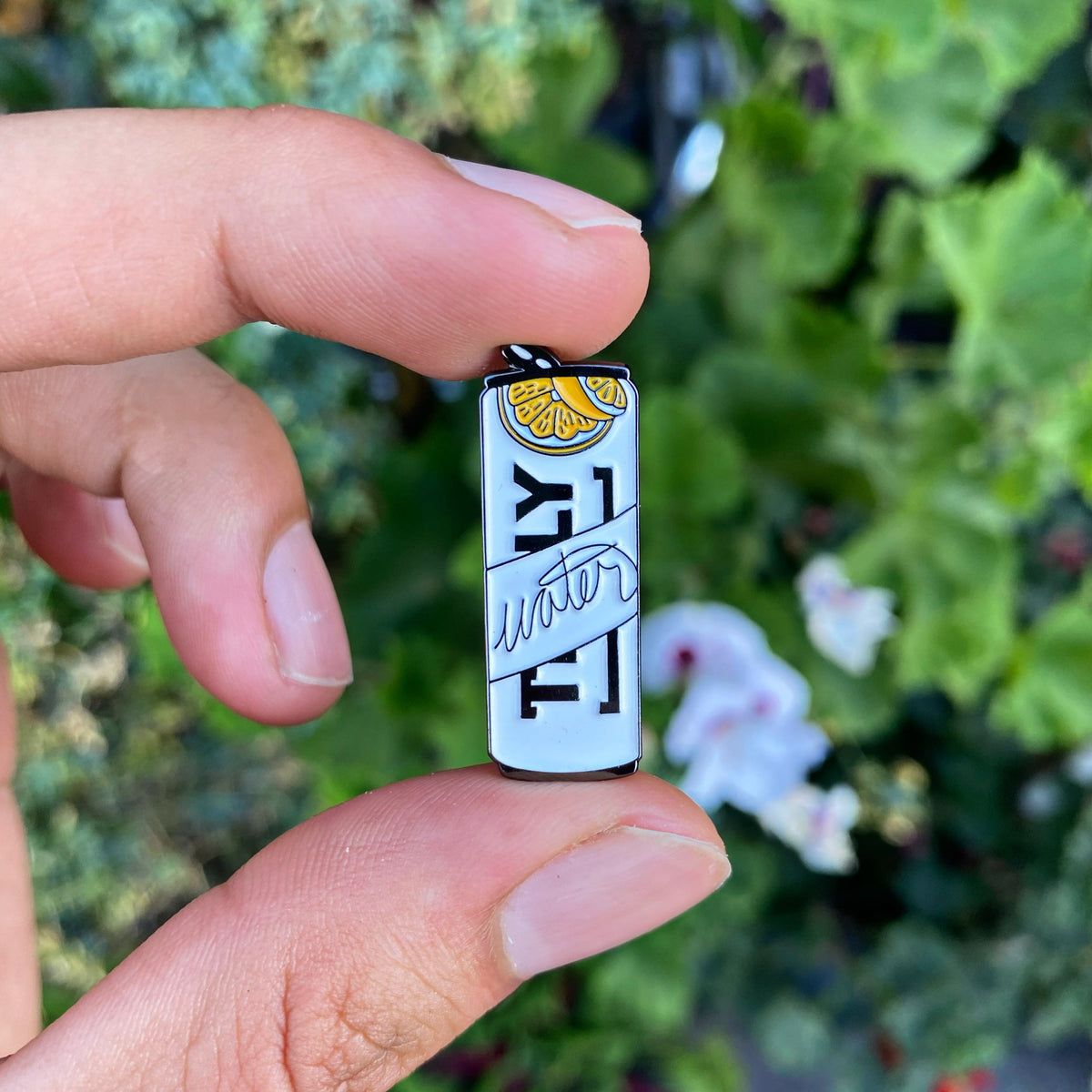 Custom enamel pins from Pinlord.com featuring colorful, detailed designs on metal with polished finish.