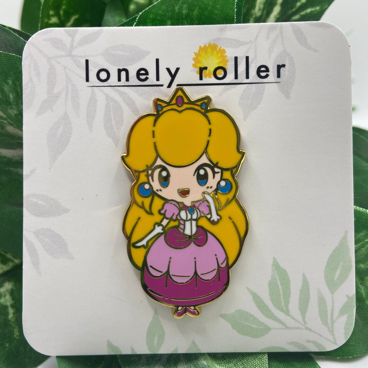 Custom enamel pins from Pinlord.com featuring colorful, detailed designs on shiny metal with a secure pin back.