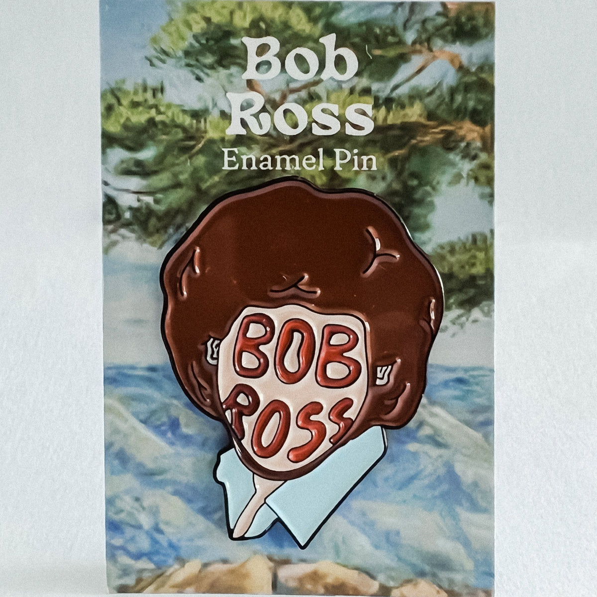 Custom enamel pins from Pinlord.com, featuring vibrant, detailed designs on high-quality metal with colorful enamel fills.
