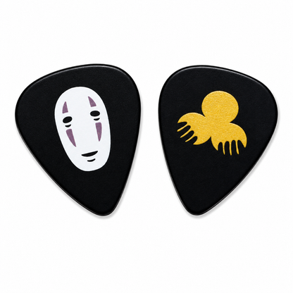 Gold No Face guitar pick by Pinlord.com, featuring a unique No Face design, ideal for guitar players.