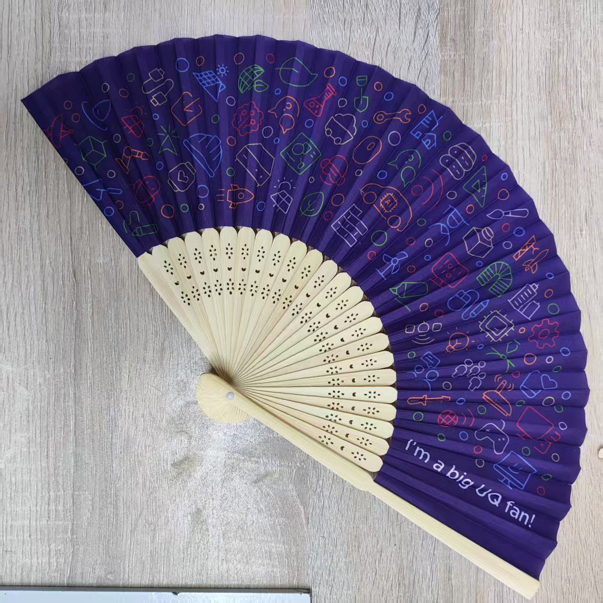 Custom hand fans with intricate designs, featuring vibrant colors and elegant patterns, perfect for events and personal use.