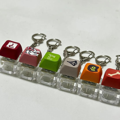 Custom keycap keychains featuring colorful, detailed designs from Pinlord.com, perfect for keyring accessories.
