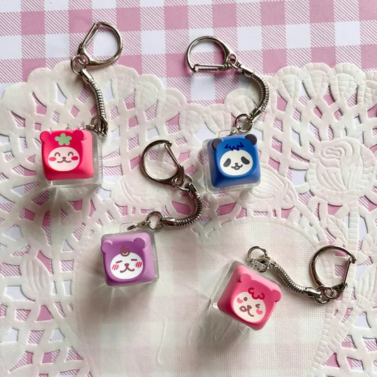 Colorful custom keycap keychains featuring unique designs, perfect for keyrings, made by Pinlord.com.