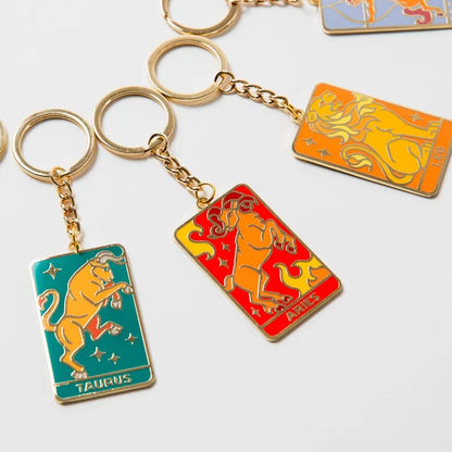 Custom keychain featuring a colorful design, made by Pinlord.com, with a metal keyring and vibrant decorative elements.