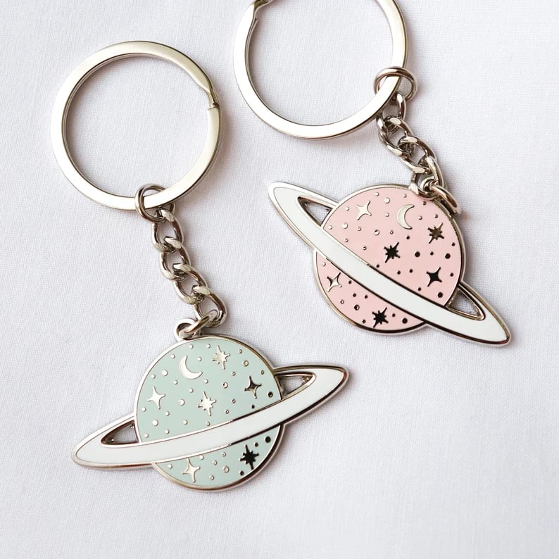 Custom Pinlord.com keychain featuring a personalized design with vibrant colors and a durable metal loop.