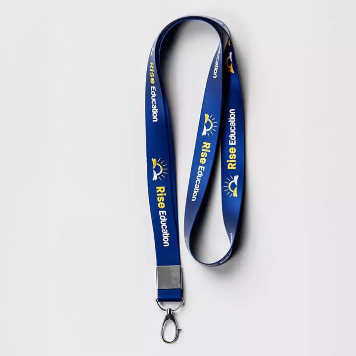 Bright custom lanyard featuring printed design, made of durable fabric, with a metal clip for holding ID badges or keys.