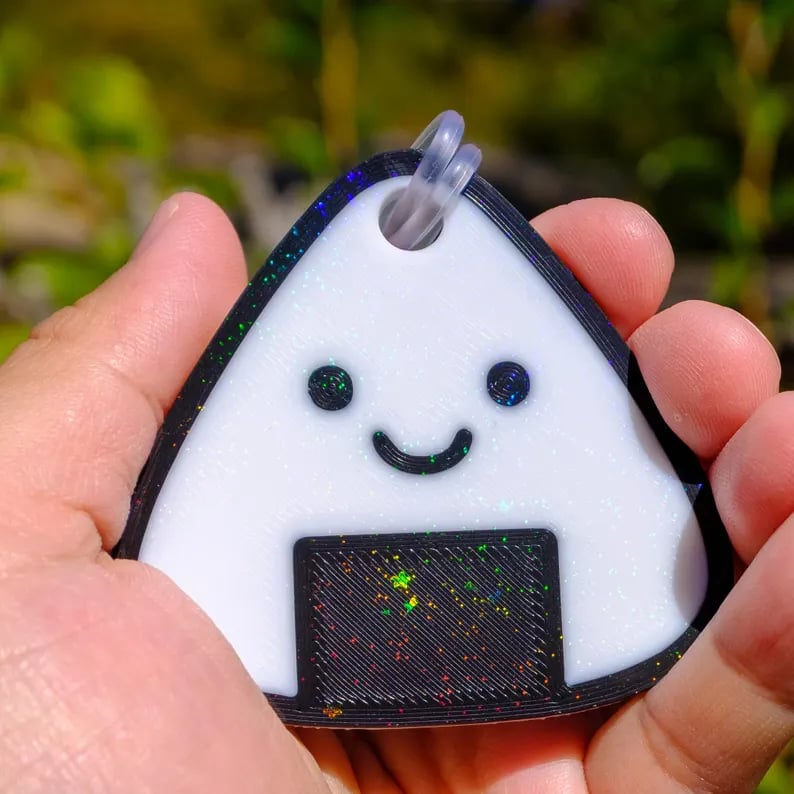 Custom luggage tag from Pinlord.com featuring a personalized design with durable strap and clear identification window.
