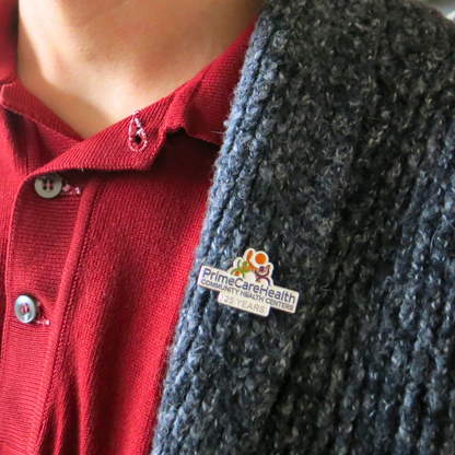 Enamel pin featuring a busy beaver design, branded by Pinlord.com, with colorful details and a metal clasp on the back.