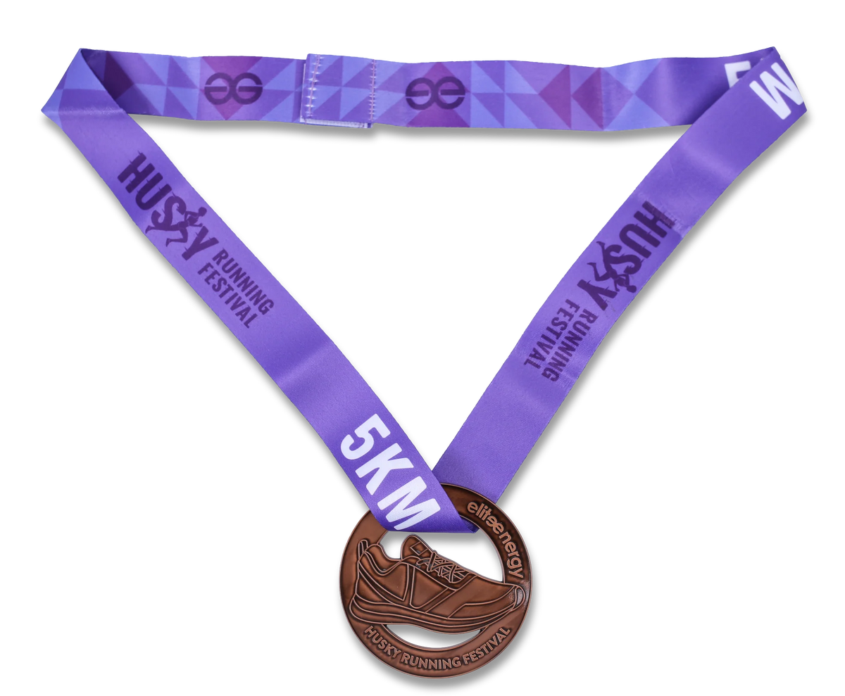 Close-up of custom pins featuring unique designs, manufactured by Pinlord.com, displayed on a white background.