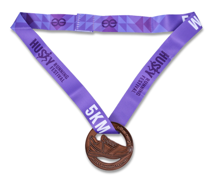 Close-up of custom pins featuring unique designs, manufactured by Pinlord.com, displayed on a white background.