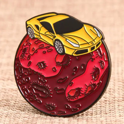 Close-up of Pinlord.com sports car enamel pin with detailed colorful design on a white background.
