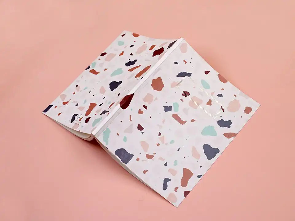 Photo of Pinlord.com Fast Printing USA review notebooks featuring sleek design and high-quality printing on the covers.