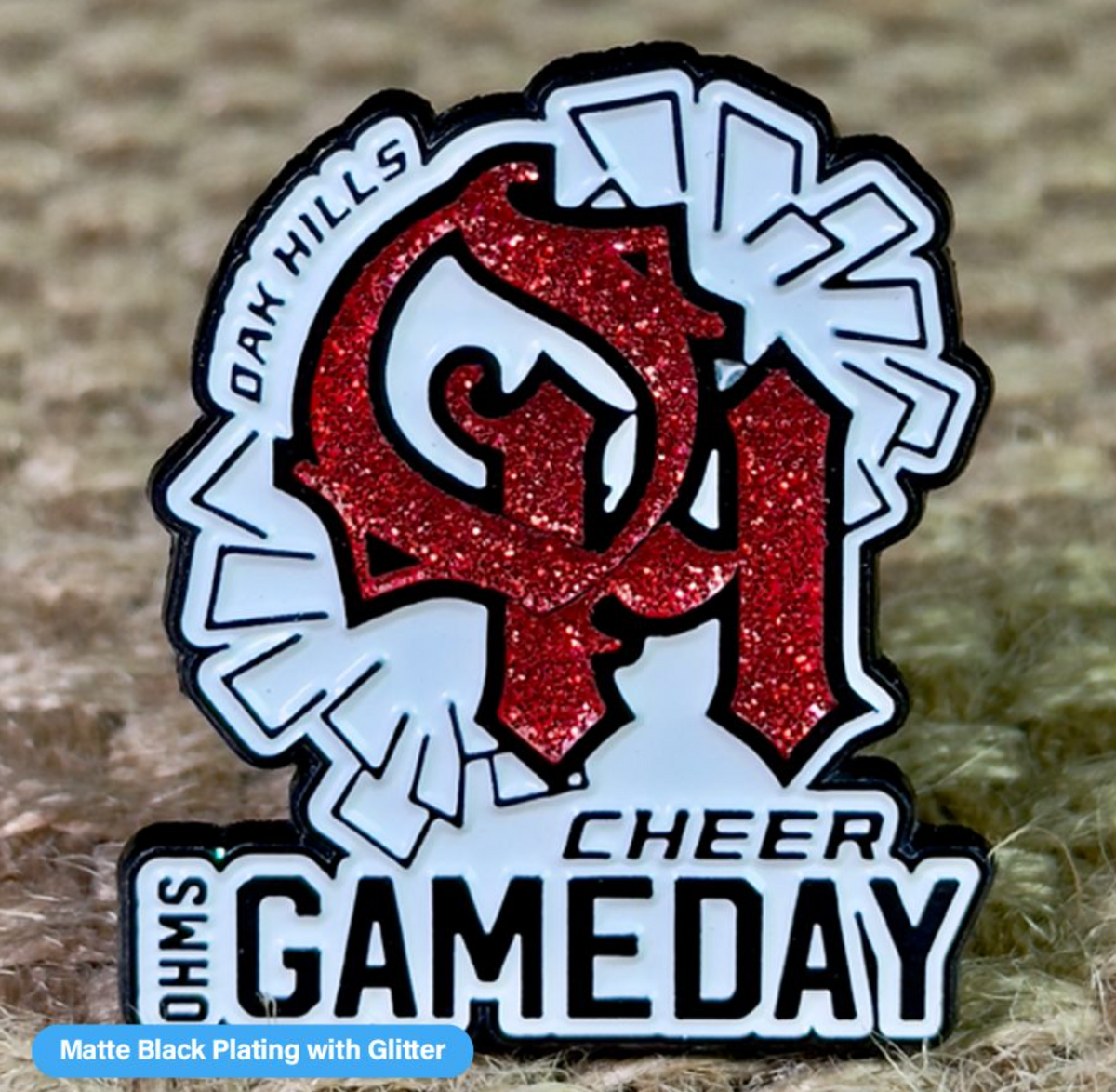 Close-up of a Pinlord.com manufacturer lapel pin featuring the Now Review design on a plain background.